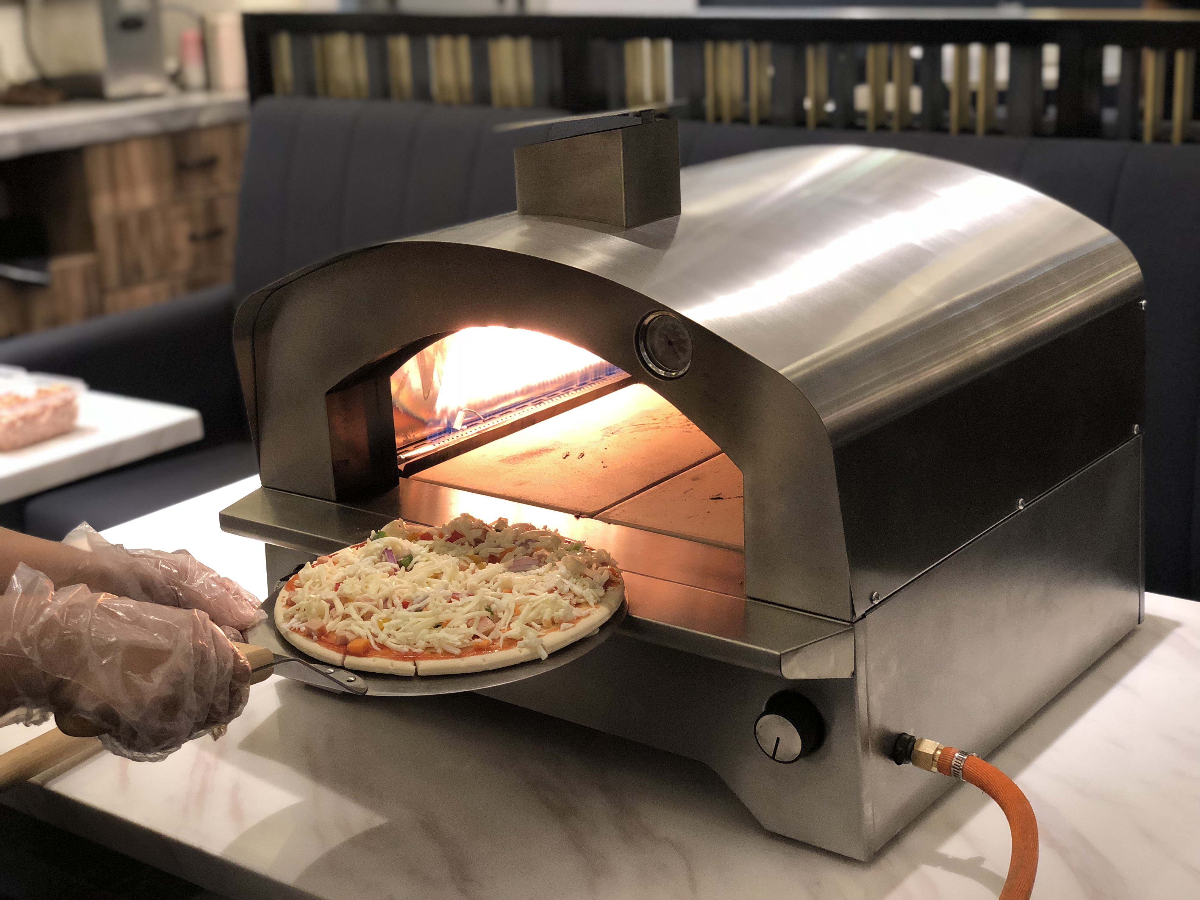 Which kind pizza oven can make a perfect and delicious pizza